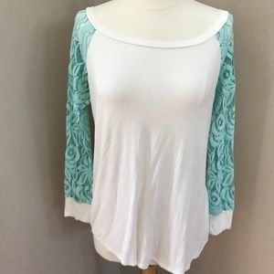 Beautiful long sleeve cream tee with lace accent